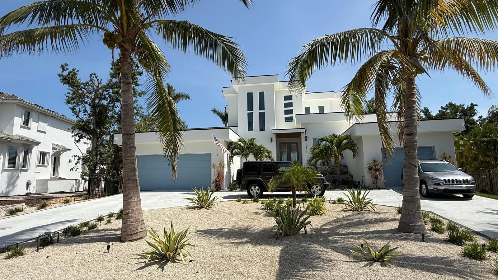 Hurricane impact windows installed on modern South Florida residence.