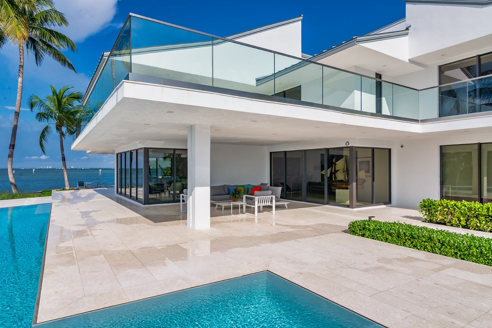Impact-resistant sliding glass doors installed in a contemporary home patio area.